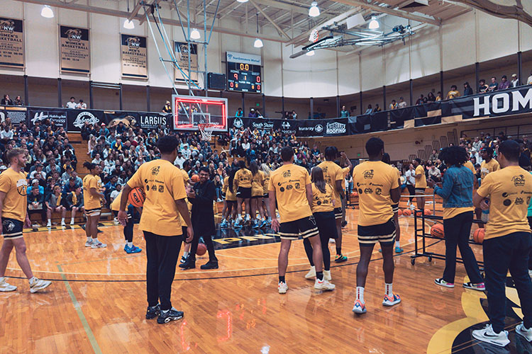 PNW basketball players warm up before the crowd at Late Night Madness.