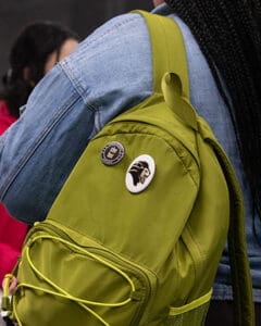 Green backpack with PNW pins