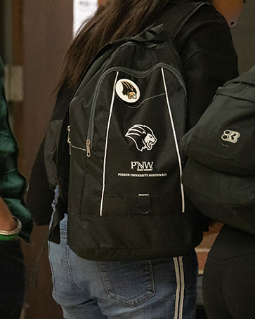 A black PNW branded backpack
