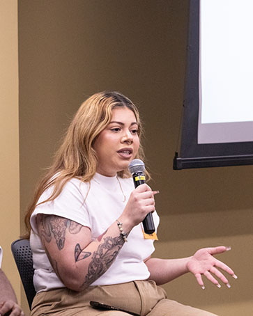 A PNW alumni presents during a panel discussion