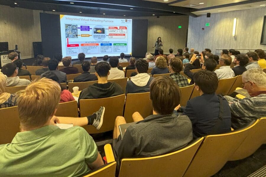 woman presenting slide to audience