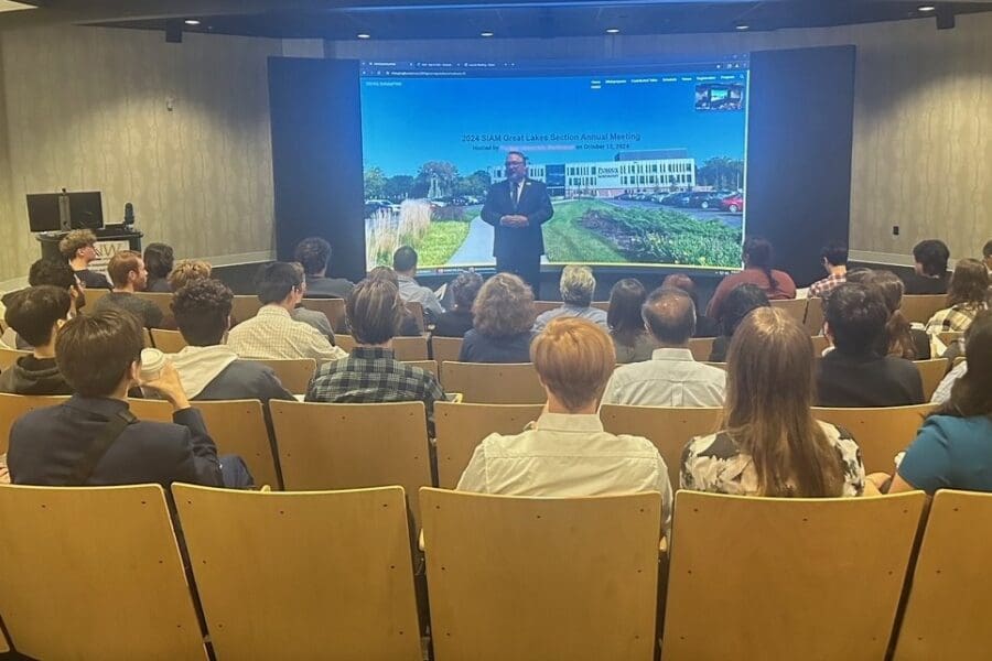 man speaking to audience