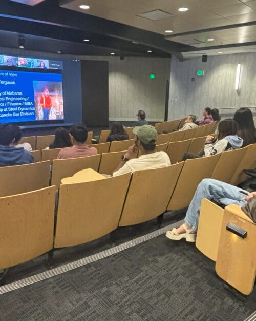 group of students watching screen