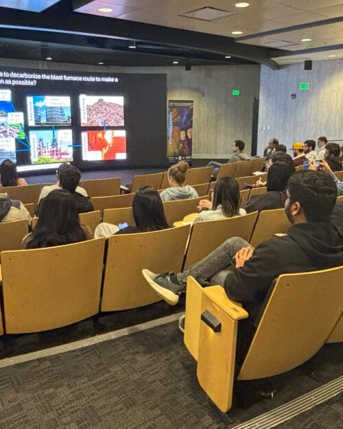 group of people watching a lecture