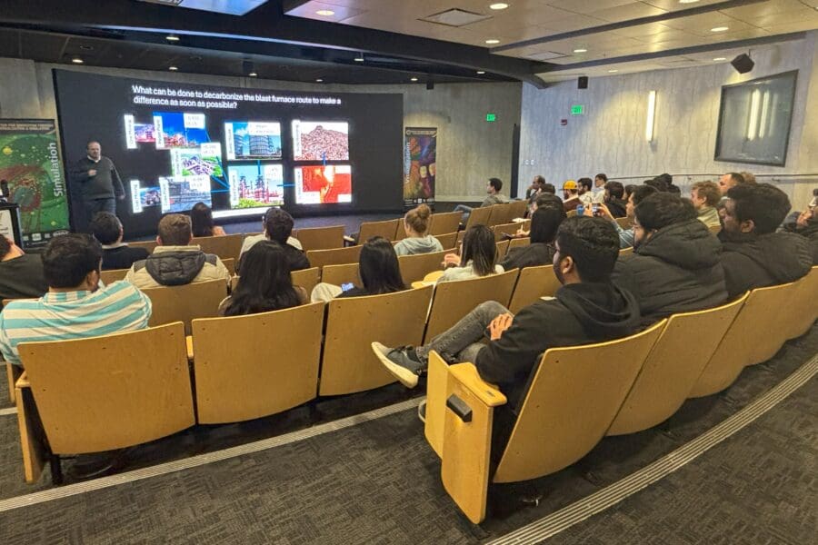 group of people watching a lecture