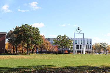 A look at the PNW Bell Tower and Nils K Nelson Bioscience Innovation Building in fall.