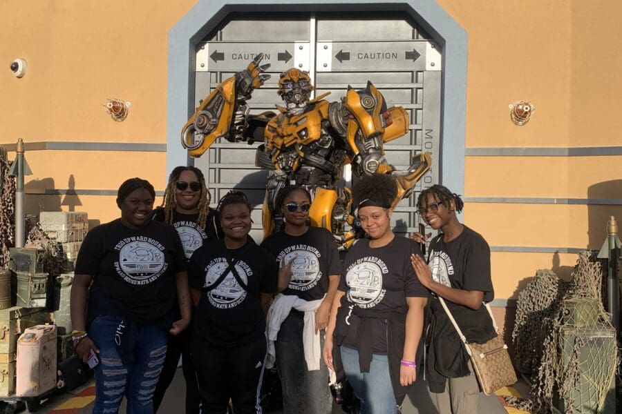 Group of students studying outside of the transformers ride at Universal Hollywood