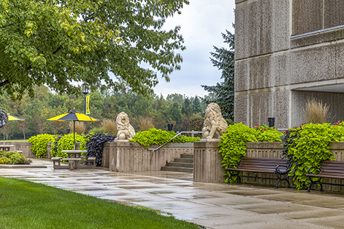 Lion sculptures in front of a building on PNW's Westville Campus