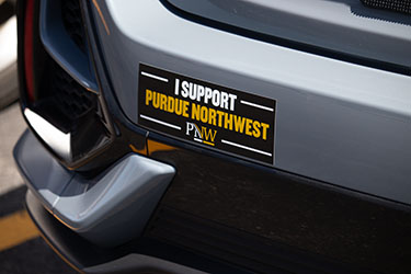 Day of Giving support sticker on car bumper