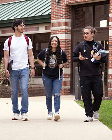 PNW students walk across campus