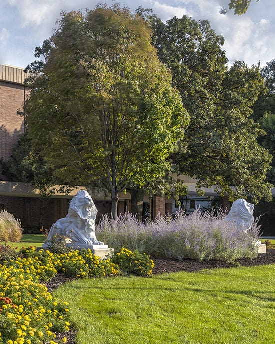 Lion sculptures outdoors on PNW's Hammond campus.