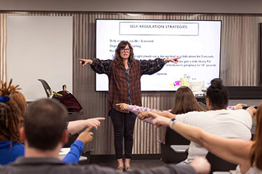 A PNW professor leads a classroom exercise