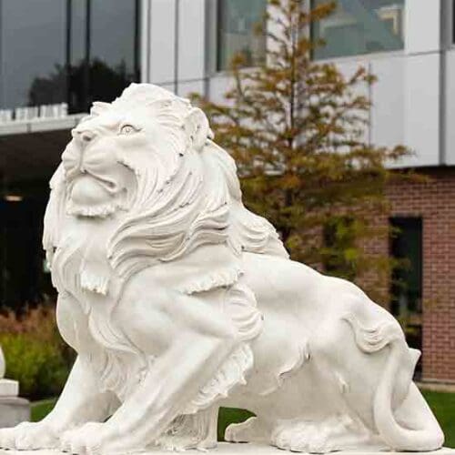 A white lion statue on the PNW Hammond Campus