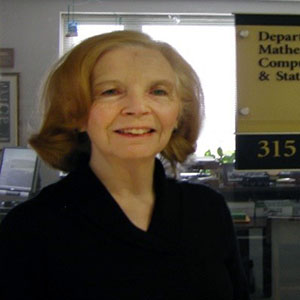 PNW Professor Emerita and Department Chair Emerita Dr. Catherine M. Murphy in front of her office