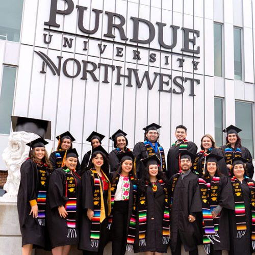 Latino graduates pose together at Purdue University Northwest.