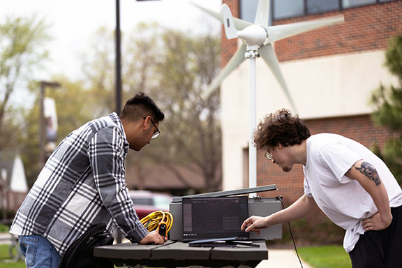 PNW students work on a windmill