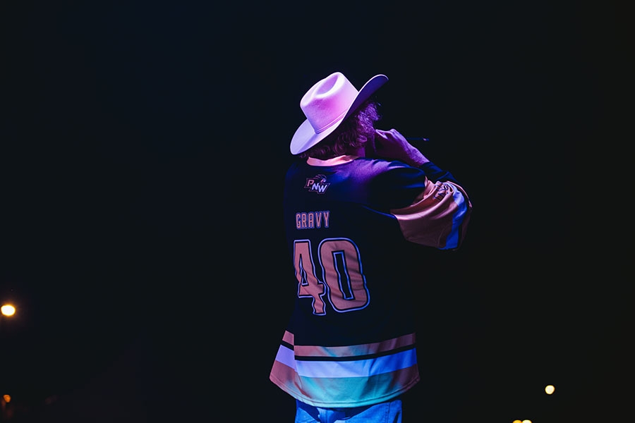 Yung Gravy performs in a custom PNW hockey jersey and cowboy hat.