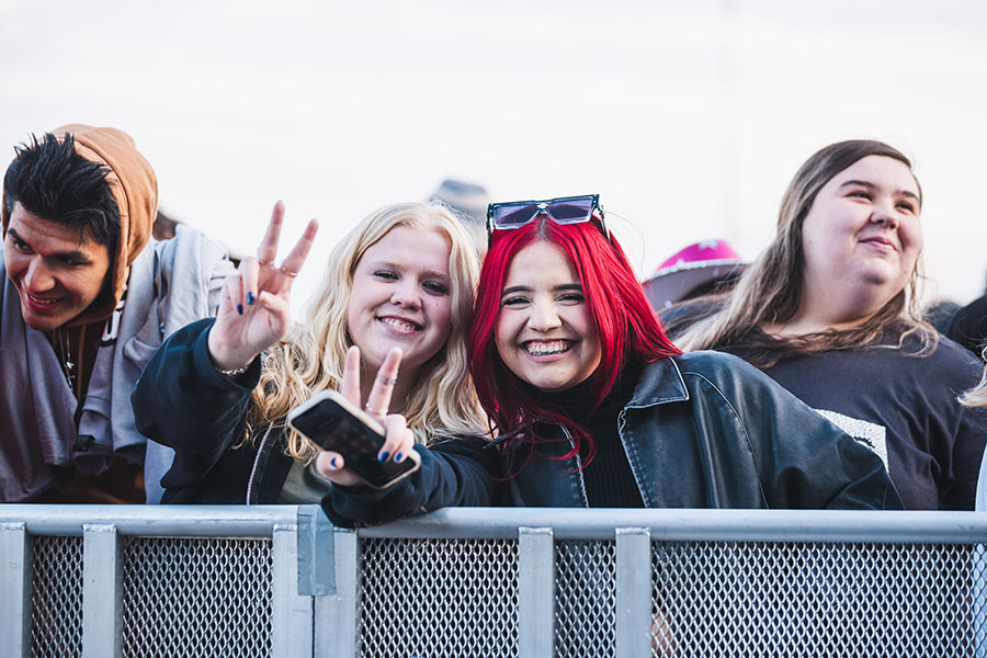 Two students pose before Roaring Loud.