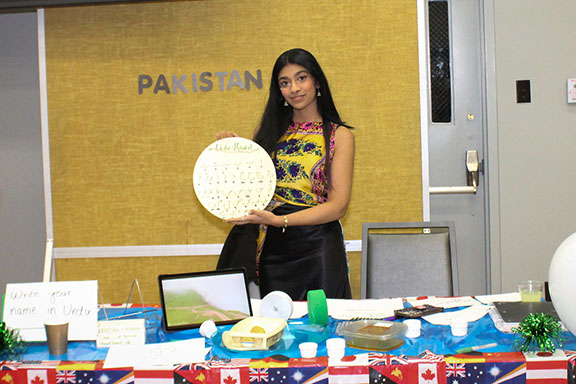 A PNW student shows off cultural elements from Pakistan at Global Groove.