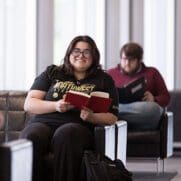 A student reads in a lounge on PNW's Westville branch campus.