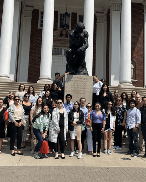 A group of students, faculty, and staff stand together during a study away trip in Tennessee