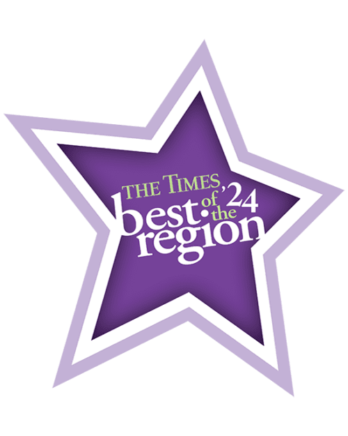 A purple star with text inside saying The Time best of the region '24.