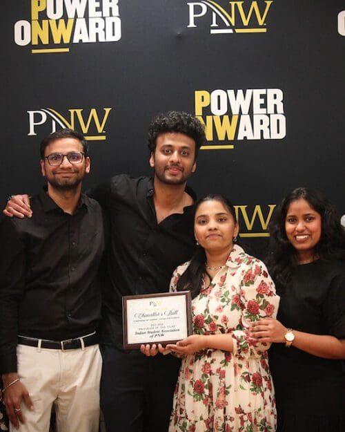 Members of Indian Student Association at Purdue University Northwest pose for a group photo after receiving the “Program of the Year” award at the second annual Chancellor’s Ball.