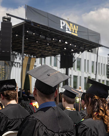PNW students outdoors at Commencement