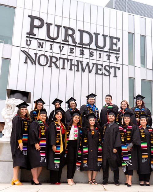 Latino graduates pose together at Purdue University Northwest.