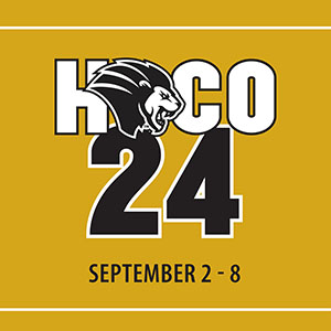 Graphic: HOCO 24. September 2-8 Background is gold, the first "O" in HOCO is a lion's head