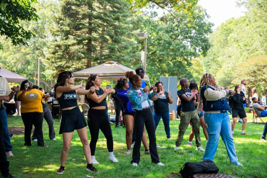 People dance at the Hammond Welcome Rally