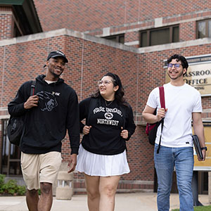 PNW students walk across campus