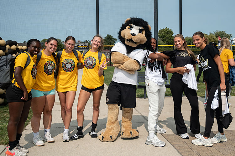 PNW athletes pose with Leo the Lion