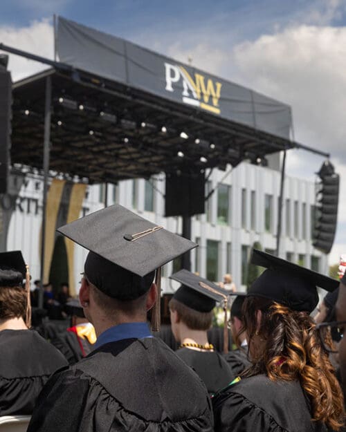 PNW students at outdoor commencement