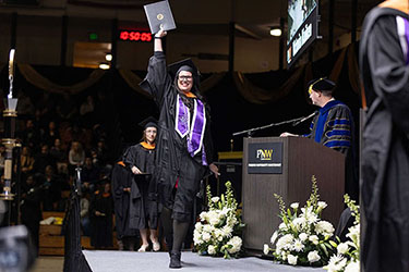 A PNW graduate lifts her degree on stage