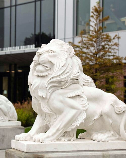 A lion sculpture outside the Nils K. Nelson Bioscience Innovation Building