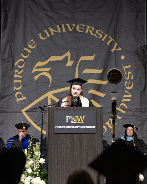 Chloe Belford speaks during Commencement