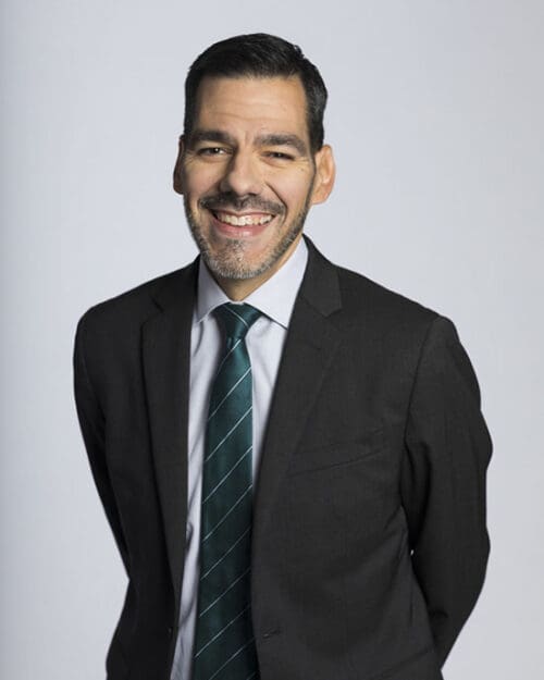 Jose Sanchez in a suit and tie