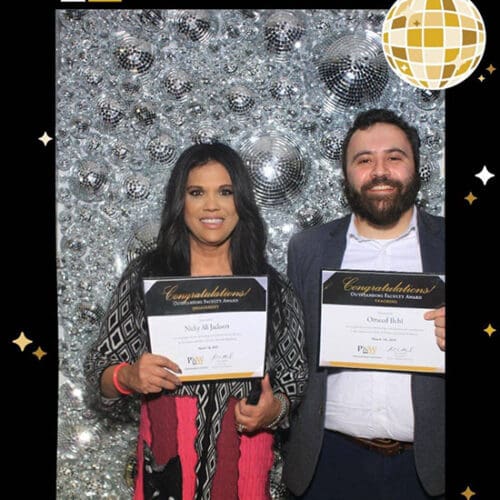 PNW professors Nicky Jackson and Omeed Ilchi display their outstanding faculty awards from Founders Day 2025.